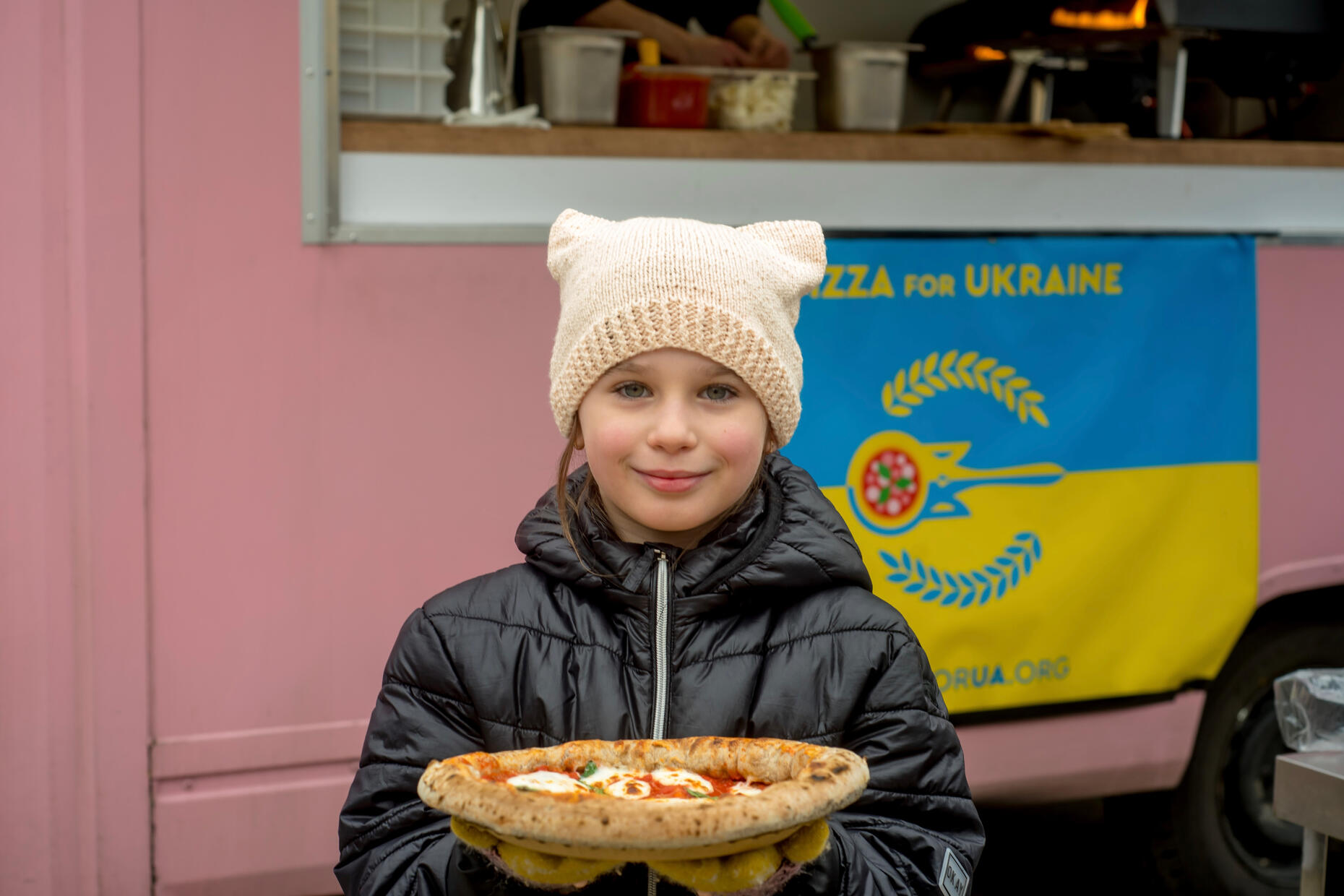 Ukrainian Girl with Pizza